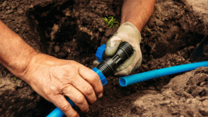 Drip line irrigation system repair in garden